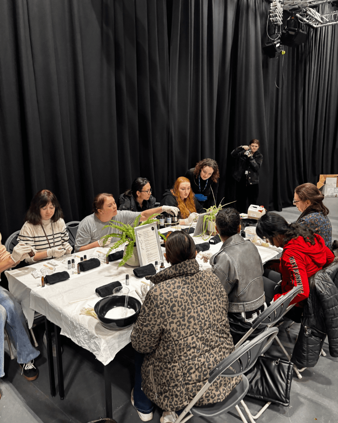 A group of women at a crafts table at the Celebrating Women event 